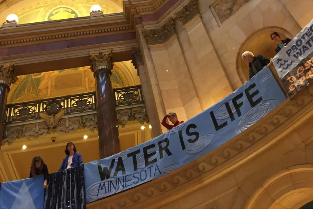 Banner reading "Water is Life Minnesota"