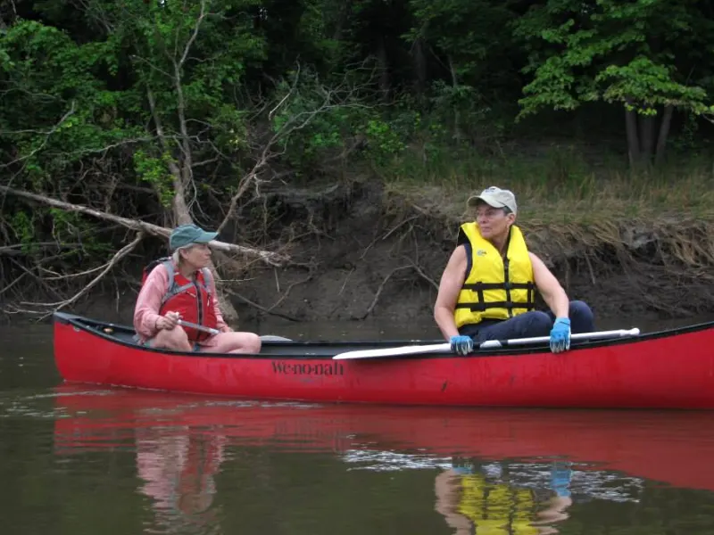 Dixie paddling with former CURE Board Member Cheryl Landgren.