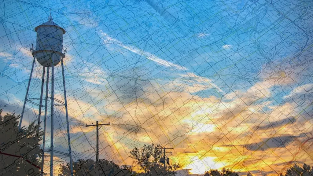 Water tower at sunset with Minnesota map overlay