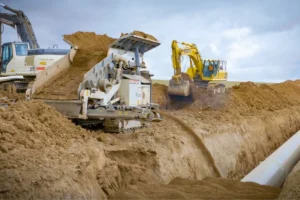 Heavy Equipment digging a Pipeline