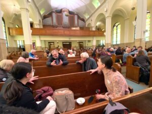 Climate activists having discussions at Christ Lutheran Church.