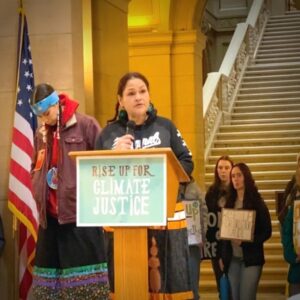 Nicole Perez, Little Earth resident, speaking at the capitol at the rise + repair rally