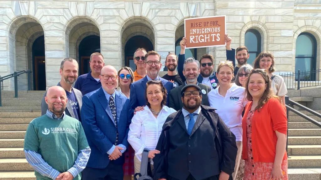 Minnesota stakeholders and lawmakers on the steps of the Minnesota State Capitol celebrating the budget signing on Wednesday, May 24, 2023.