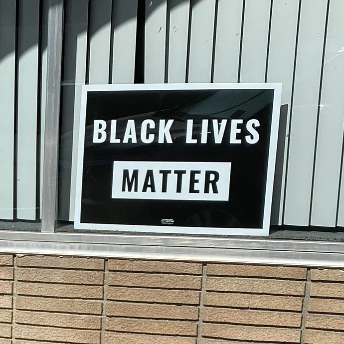 Black Lives Matter sign in window