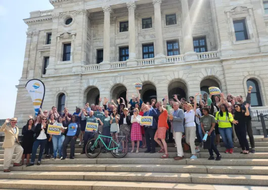 Group of people on steps of MN Capitol