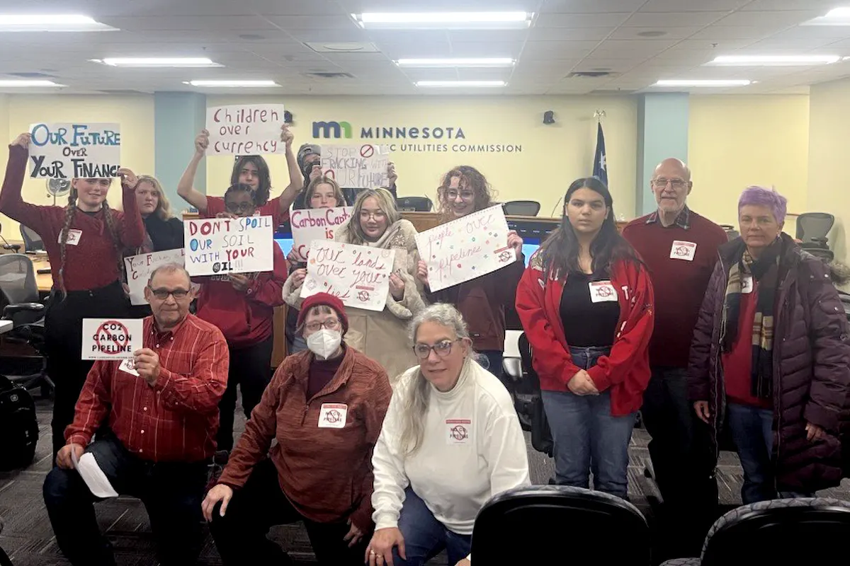 Students with CO2 protest signs