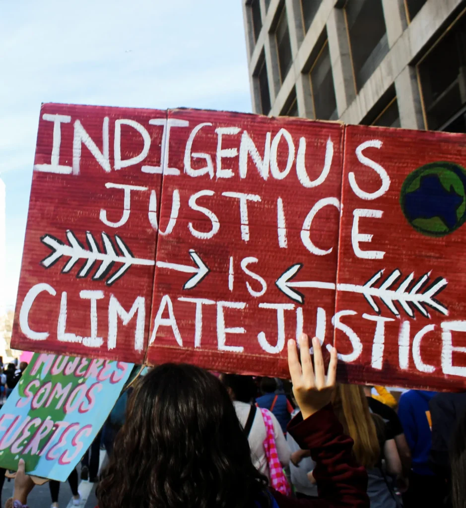 A sign that says Indigenous Justice is Climate Justice