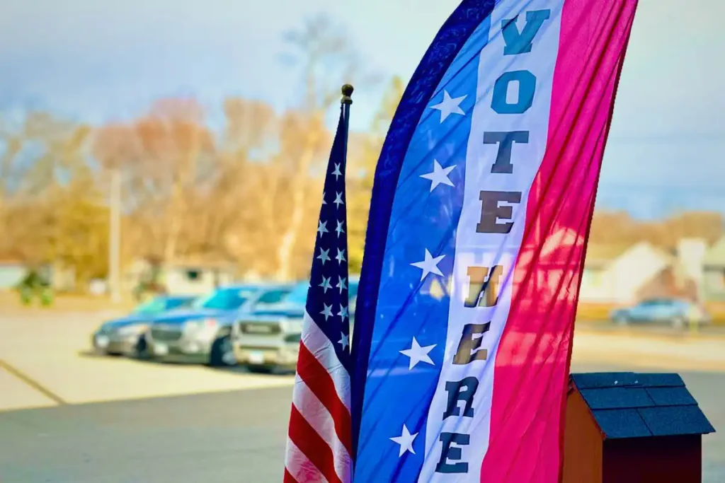 vote here banner at a polling place