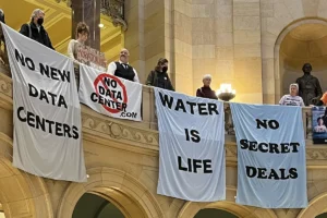 Banners in the MN state capitol at a data center rally