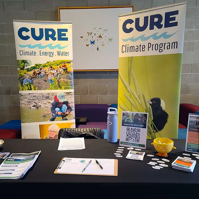 CURE Table at Sea of Grass Reading at UMM