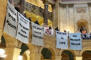 banners at the mn state capitol during a rally for data center regulation in 2026